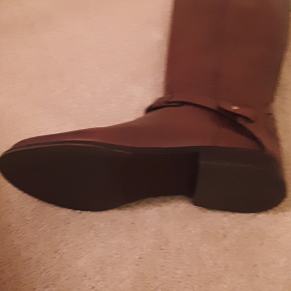 Tory Burch T Lock riding boots for Women - Brown in USA  Tony Burch Derby Riding Boot